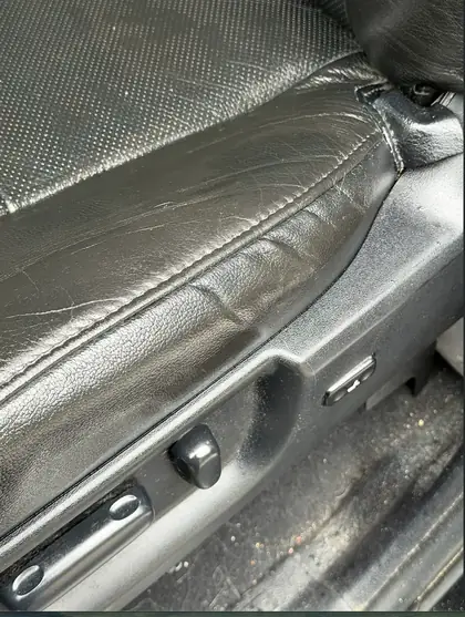 Car seat leather crack after repair Denver
