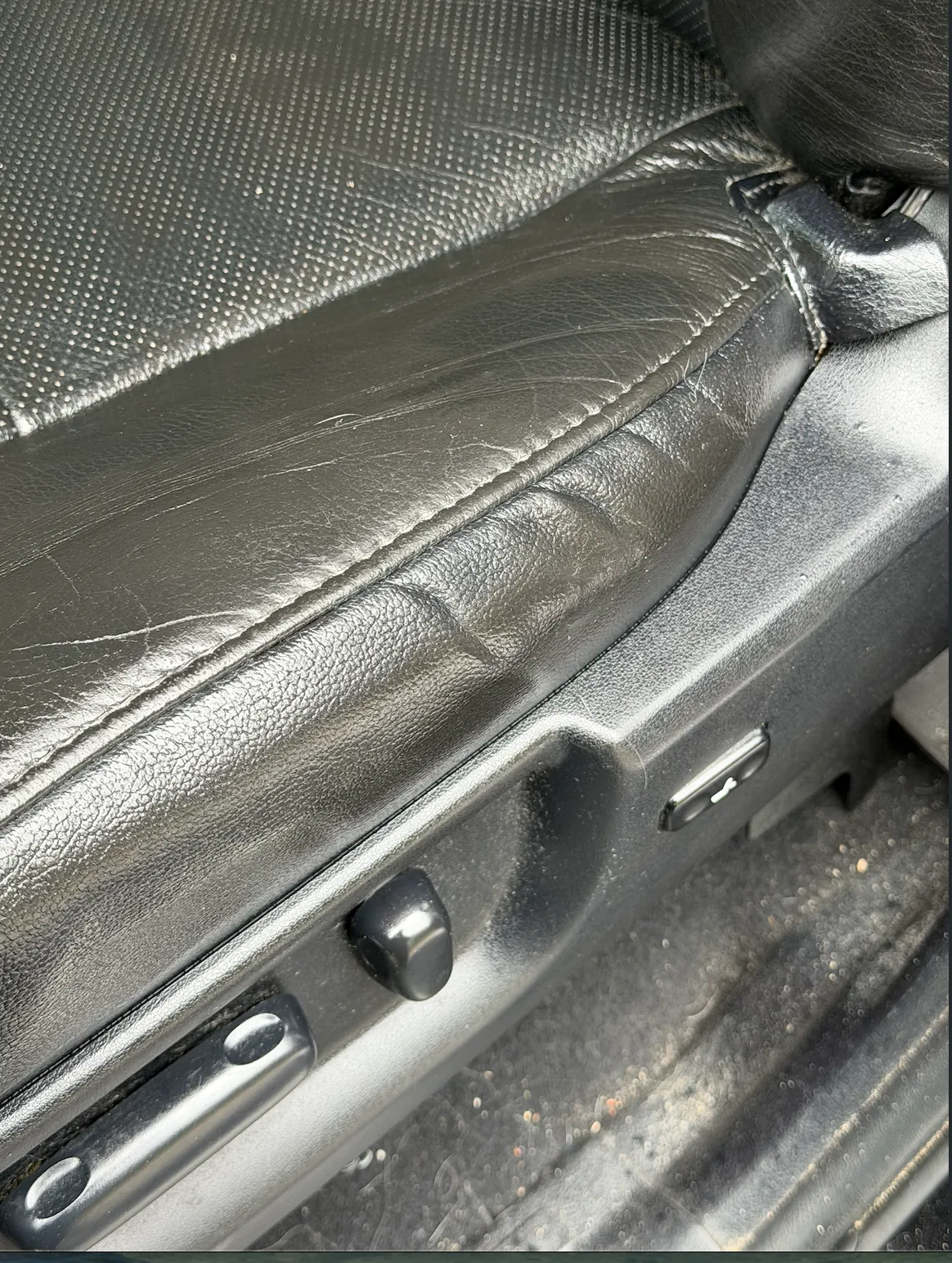 Car seat leather crack after repair Denver
