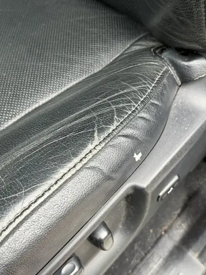 Car seat leather crack before repair Denver