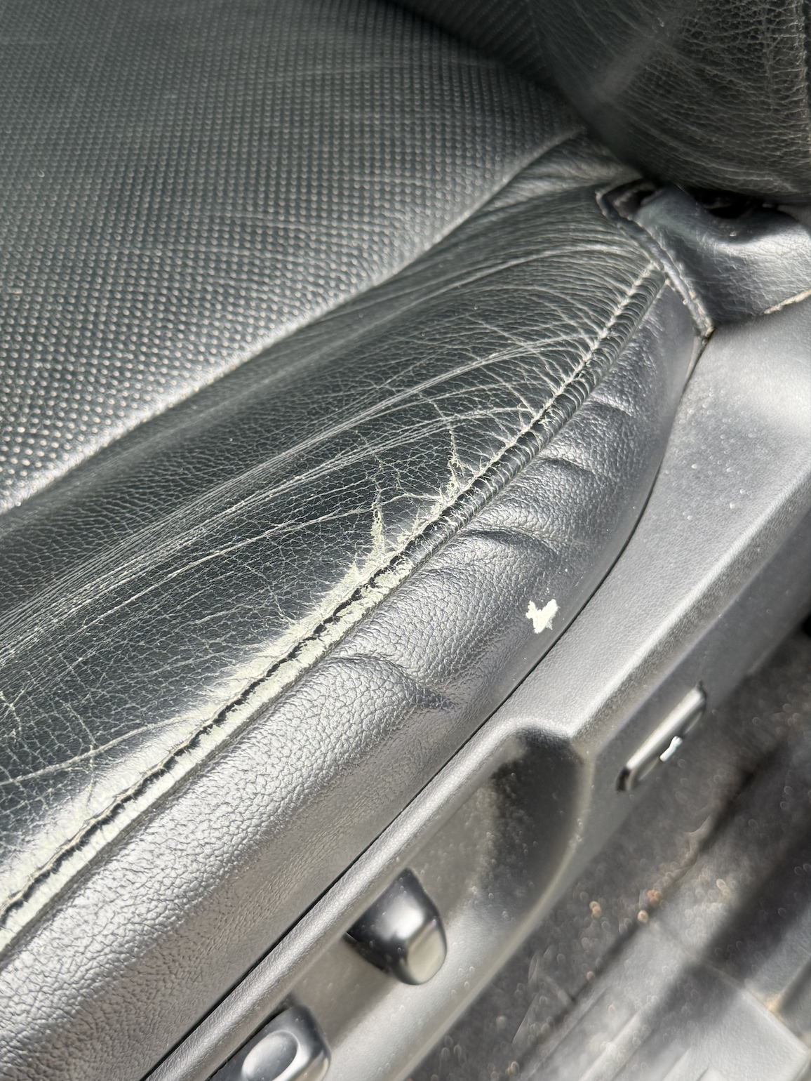 Car seat leather crack before repair